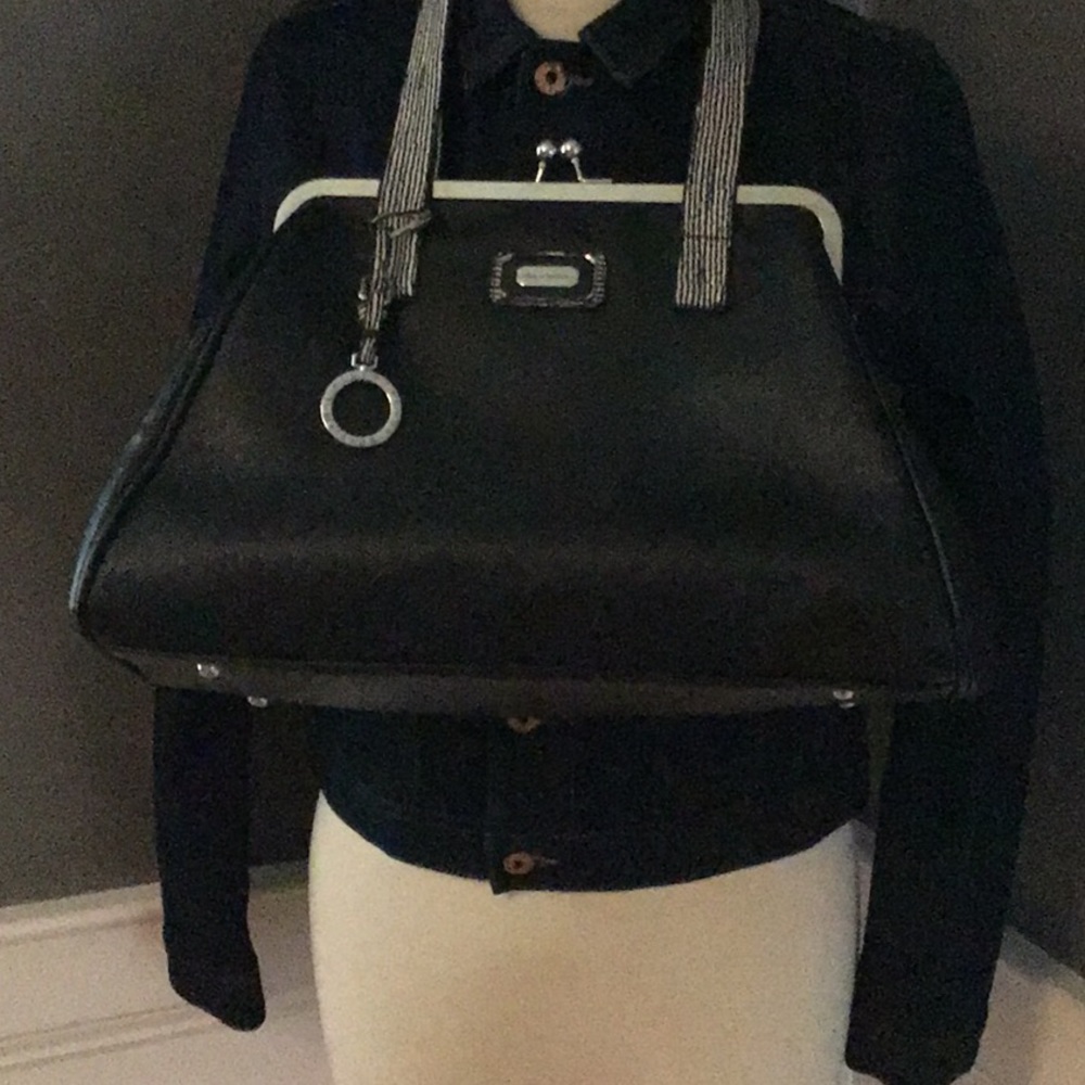 Black Catherine Malandrino handbag.